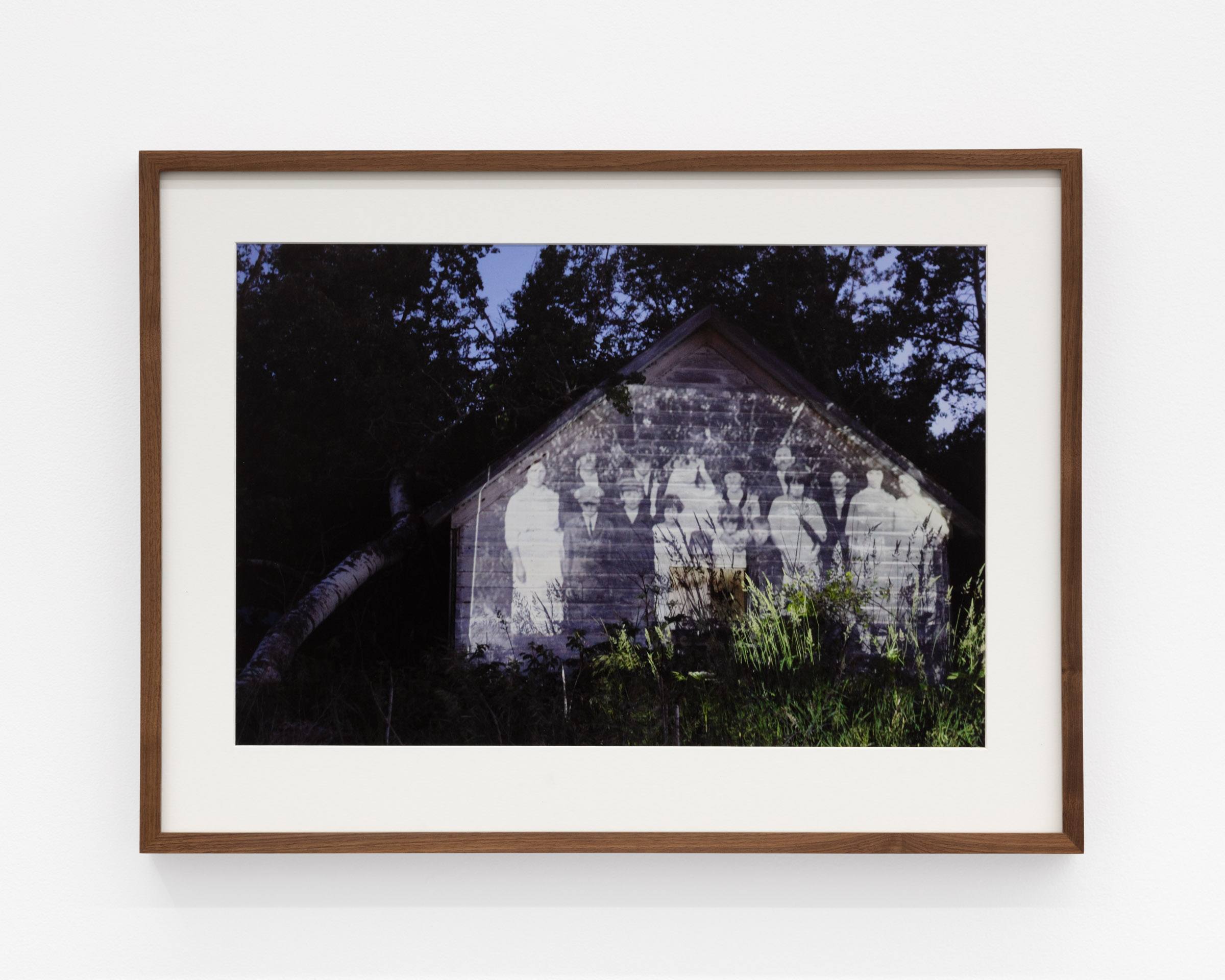 A Carpathian region Ukrainian dance costume is compressed beneath a sheet of glass.