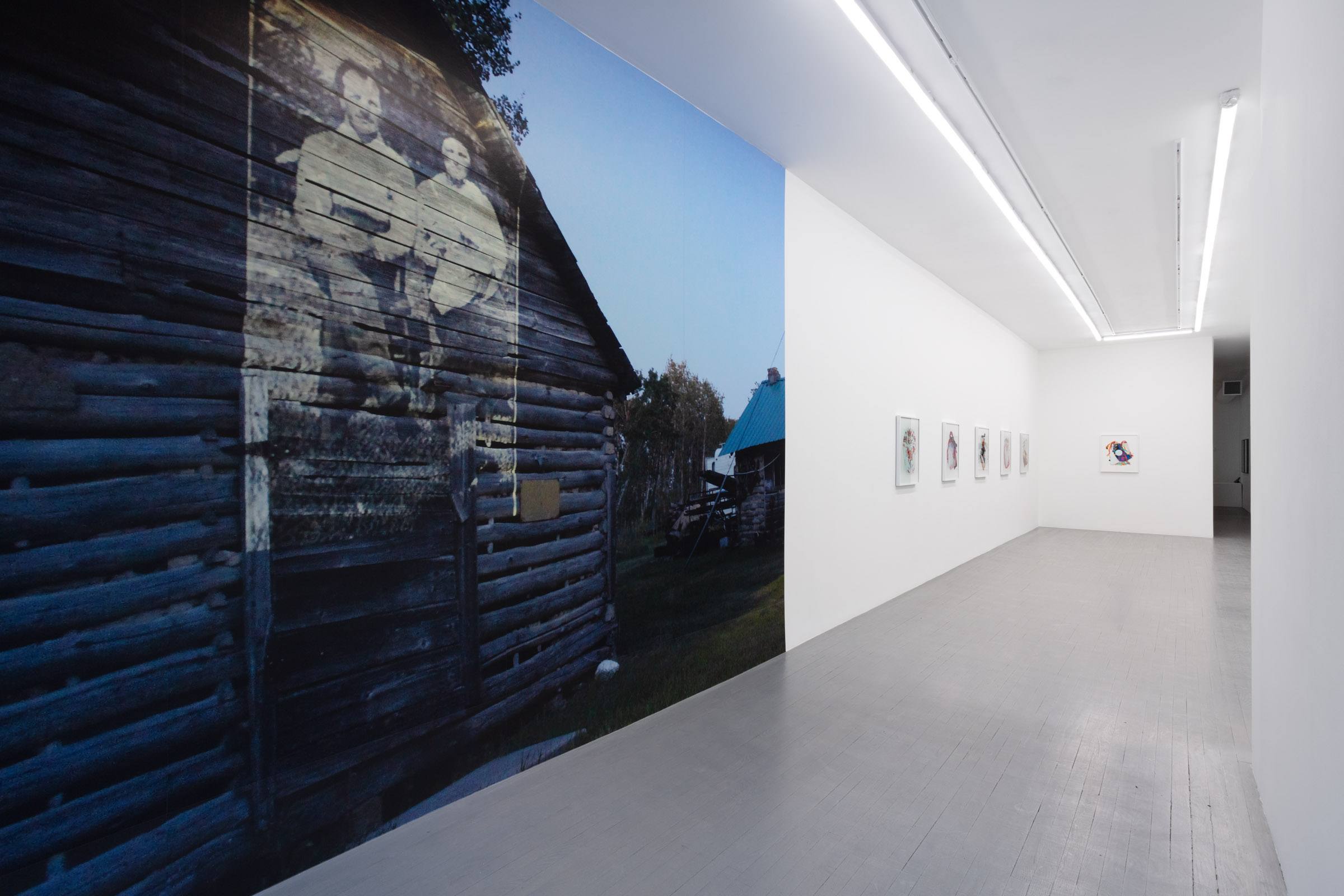 A Carpathian region Ukrainian dance costume is compressed beneath a sheet of glass.